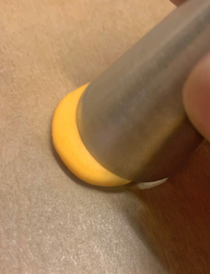 Shaping fondant pumpkin