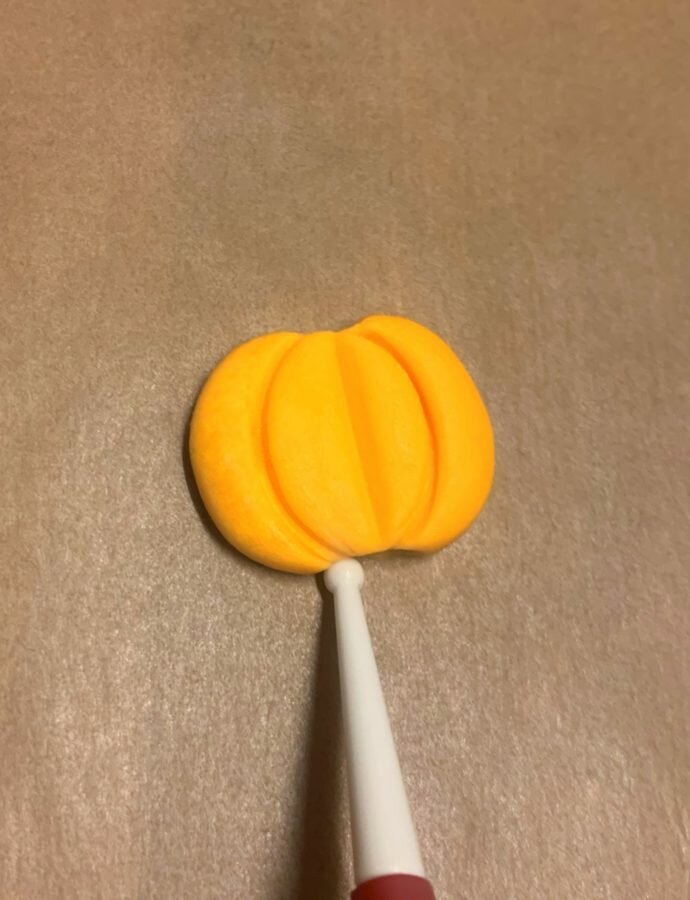 Shaping fondant pumpkin